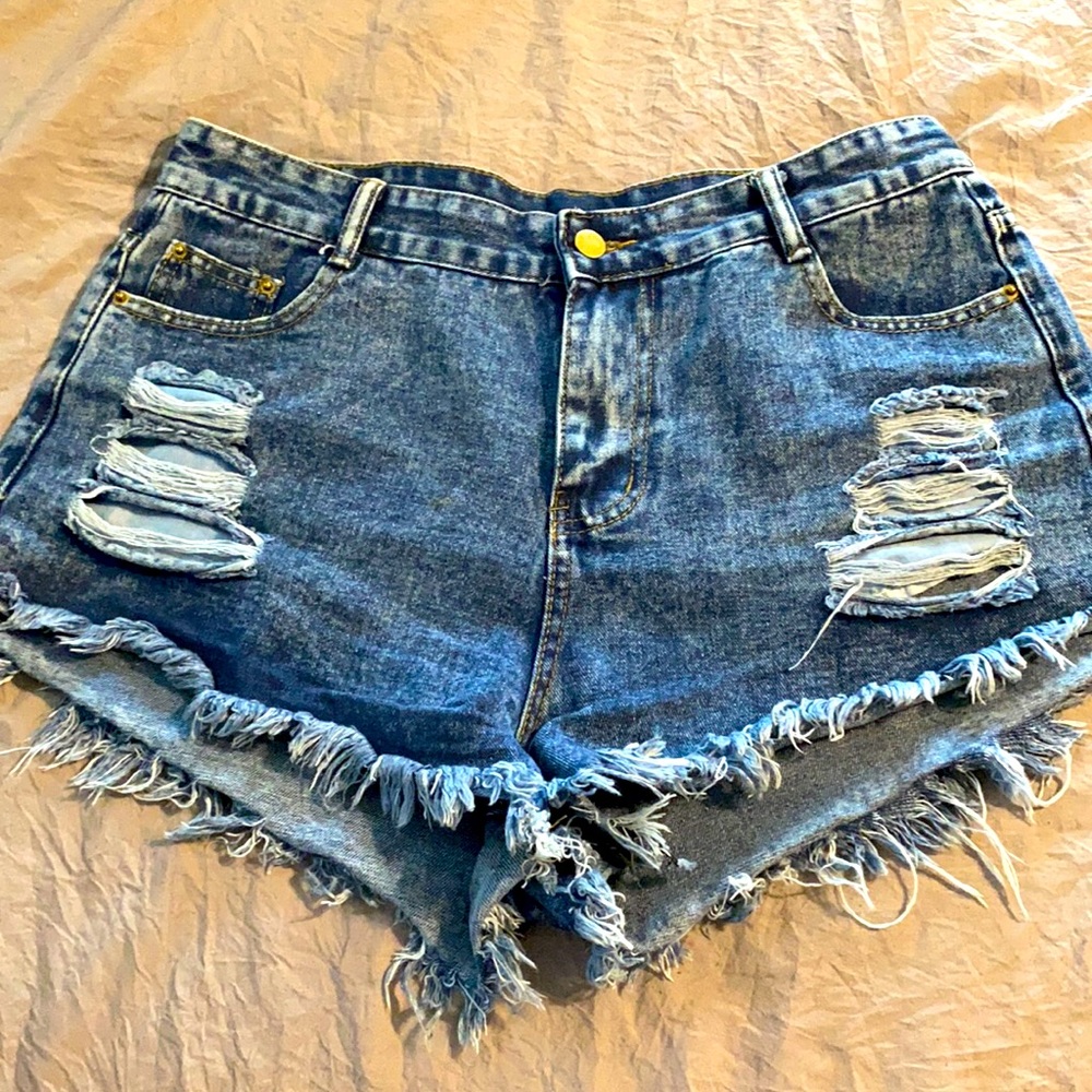 High waisted, medium wash, frayed jean shorts
